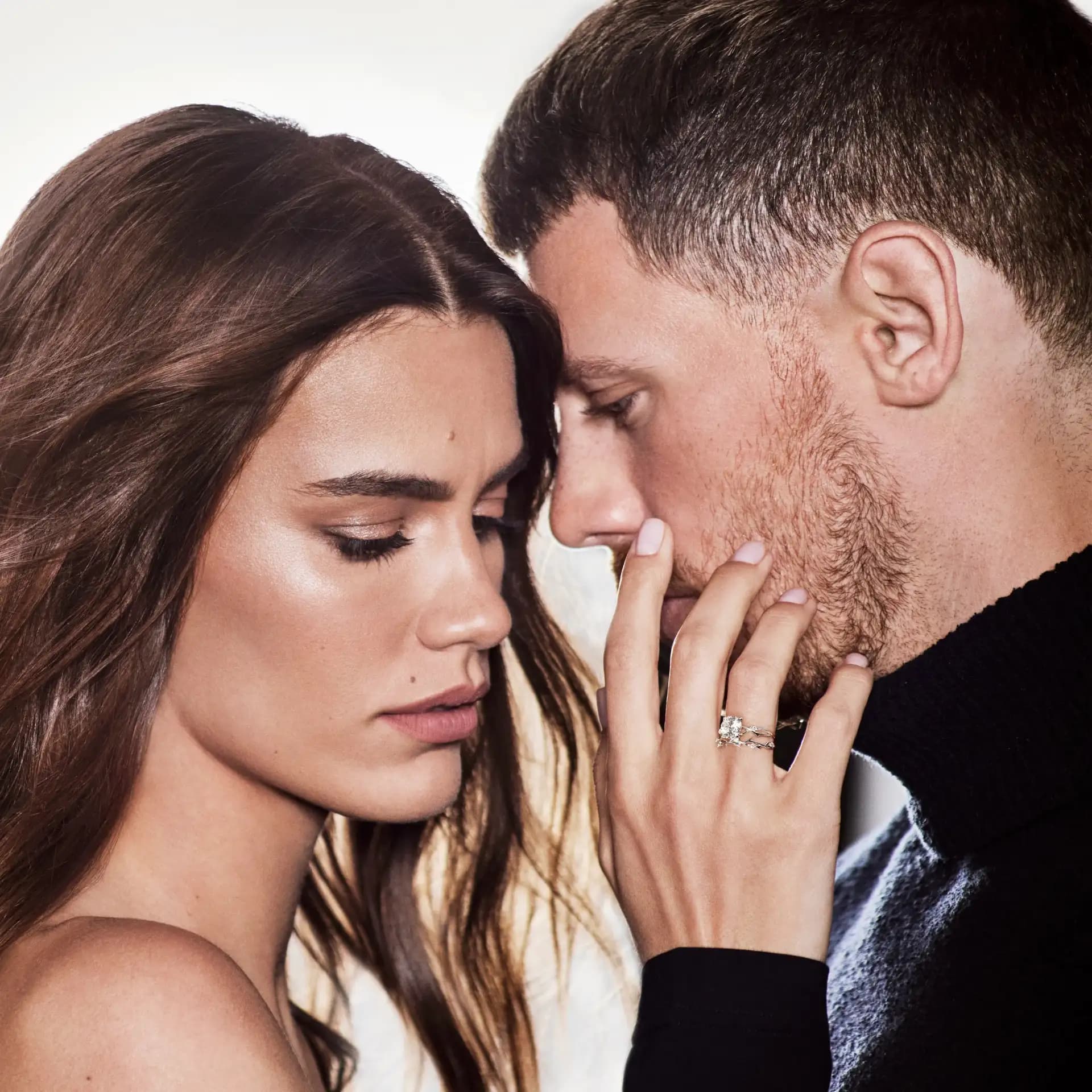 Couple wearing Trishty engagement rings